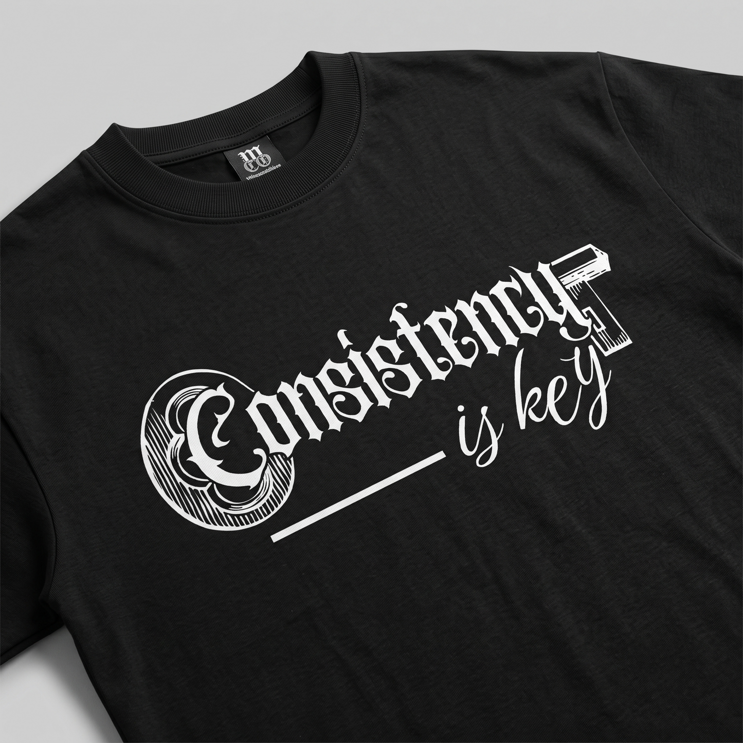 Consistency is key - Premium Oversized Front Print Drop Shoulder Cotton T-Shirt